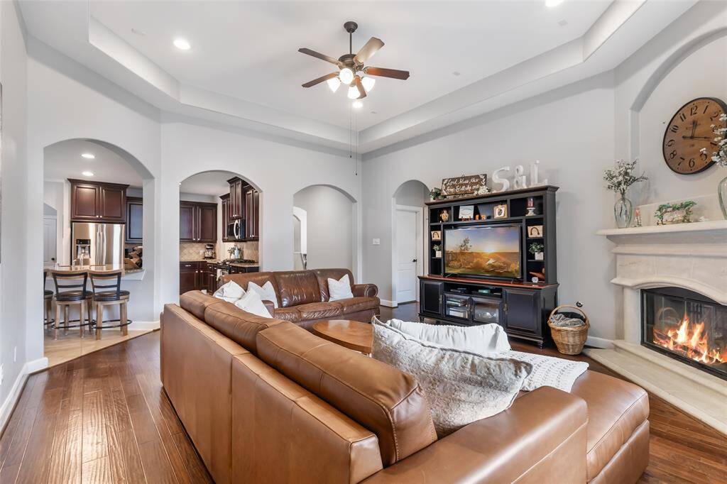 Living Room with Tray Ceiling & Gas Log Fireplace
