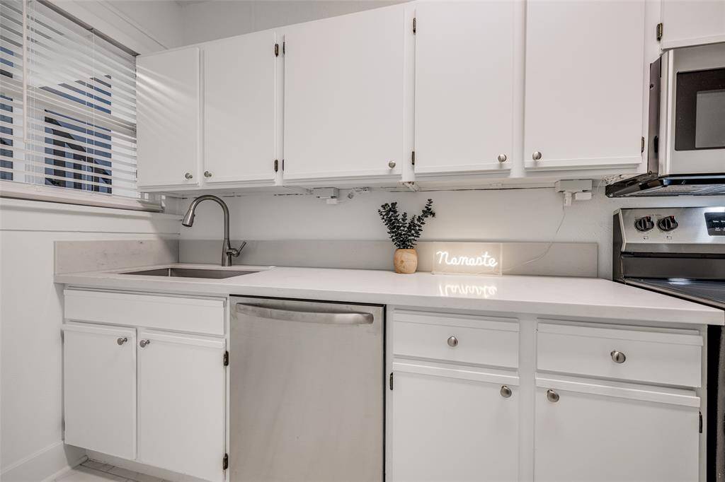 Kitchen MODEL PHOTOS OF SAME FLOOR PLAN (DOWNSTAIRS) UNIT
