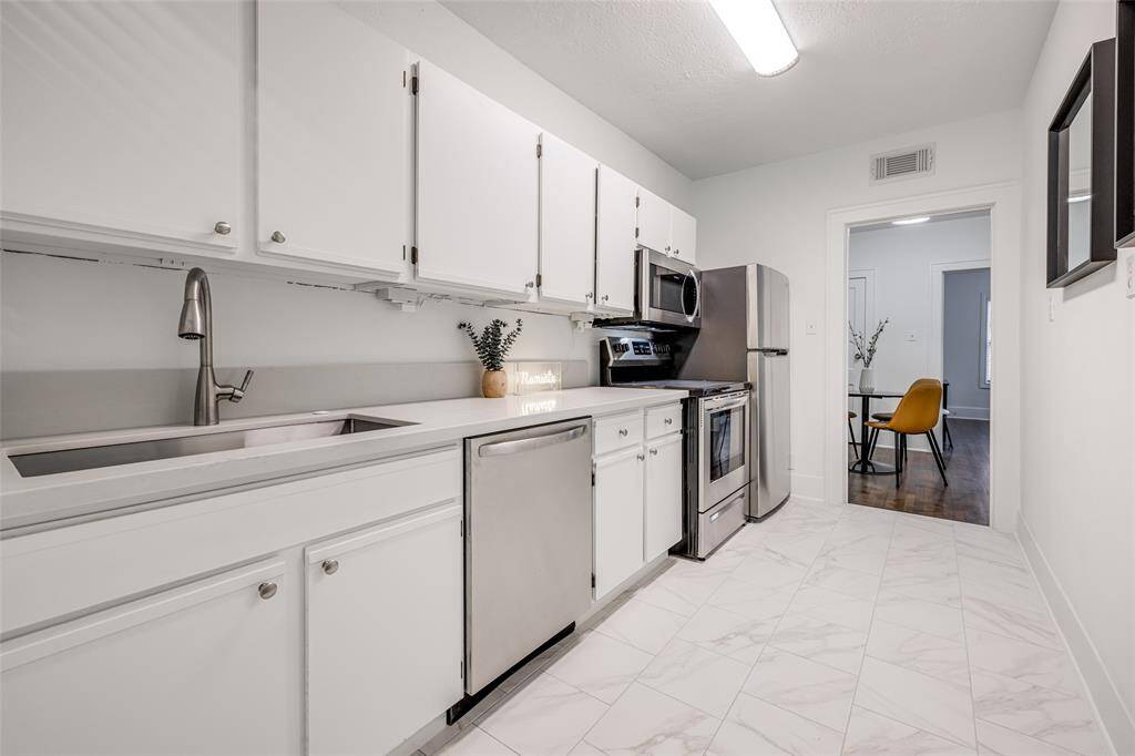 Kitchen MODEL PHOTOS OF SAME FLOOR PLAN (DOWNSTAIRS) UNIT