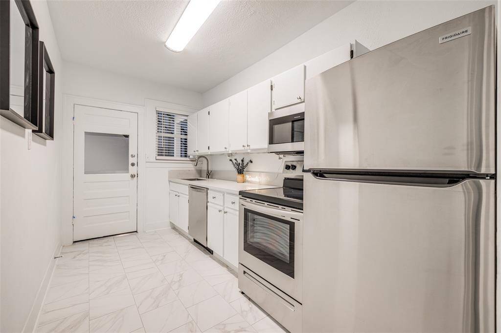 Kitchen MODEL PHOTOS OF SAME FLOOR PLAN (DOWNSTAIRS) UNIT