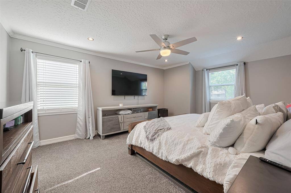 Primary Suite has lots of natural light, recessed lights too