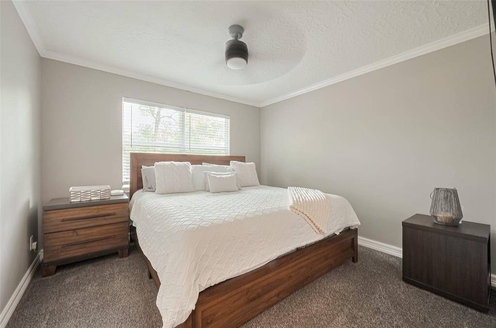 This secondary bedroom#4  shows plenty of room even with a king bed!