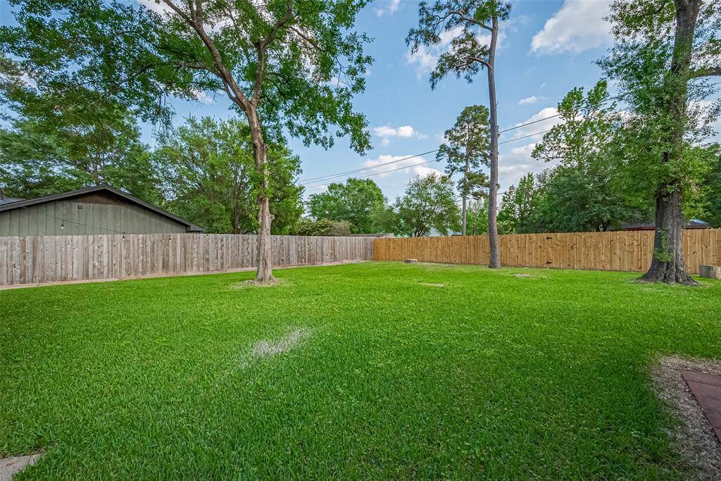 Spacious and serene backyard, perfect for relaxation and outdoor activities!