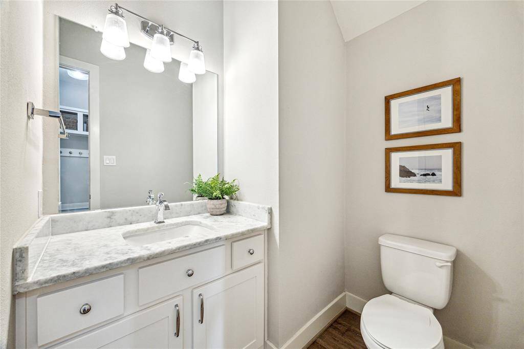 Ample storage with shelving + hanging stations in this fantastic primary closet.