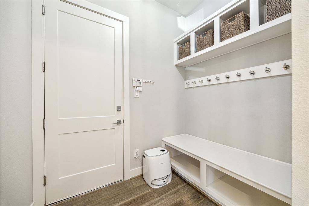 The first floor powder bath is privately, yet conveniently tucked away near the mud room.