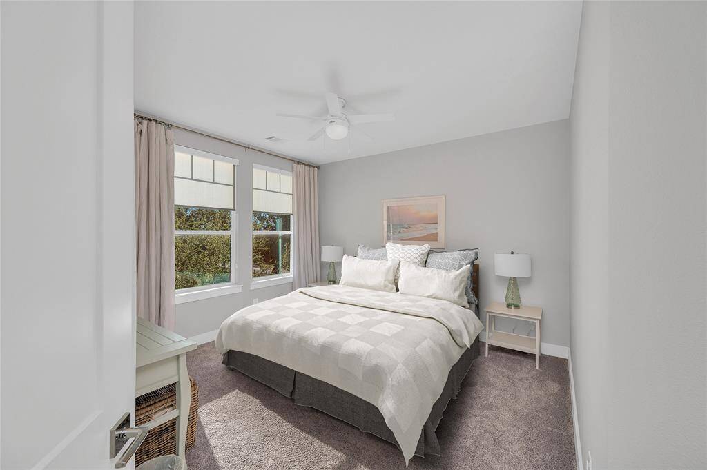 2nd floor: This secondary bedroom is sizeable enough for a king size bed (as pictured) and features a walk in closet.