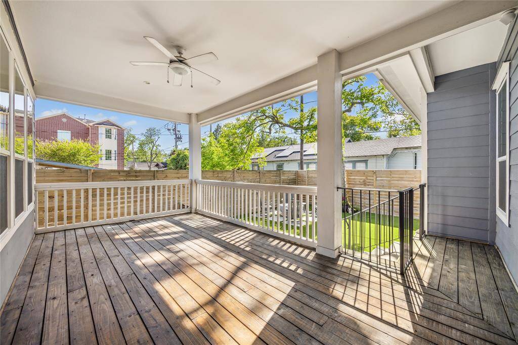 An entertainers delight! You will love spending time under the expansive covered porch + steps leading to the low maintenance turfed back green space!