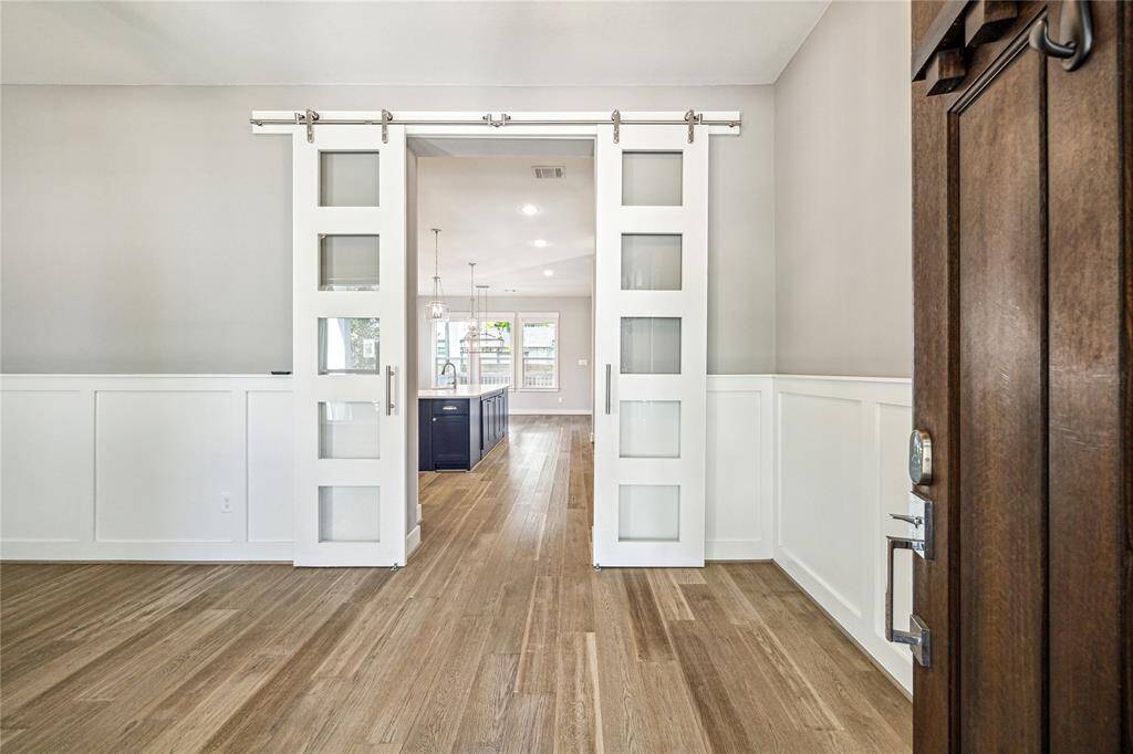 Alternate perspective of flex space *the note pocket doors that can be used for privacy (perfect for home office use).