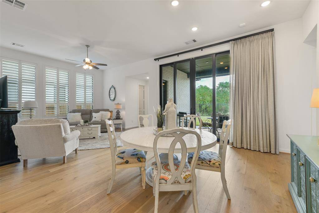 Enjoy your morning coffee with a view of the peaceful wooded greenbelt behind the home. The extra wide sliding glass door brings the outdoors in, yet with only foliage and wildlife for your rear neighbors, you'll enjoy the ultimate privacy!