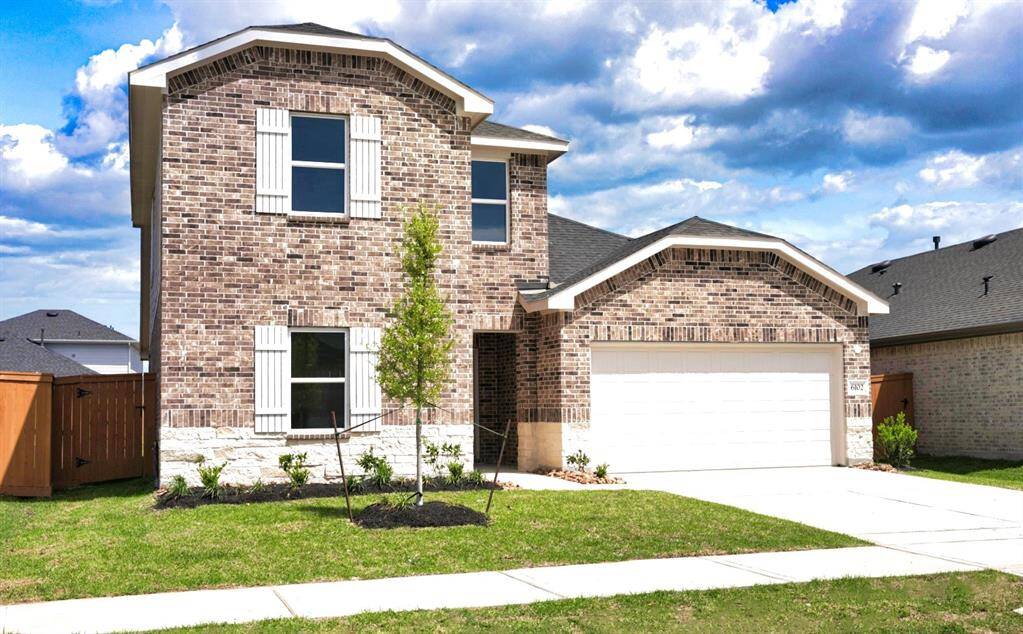 Lovely Brick and Stone Two Story Home in Sunterra!