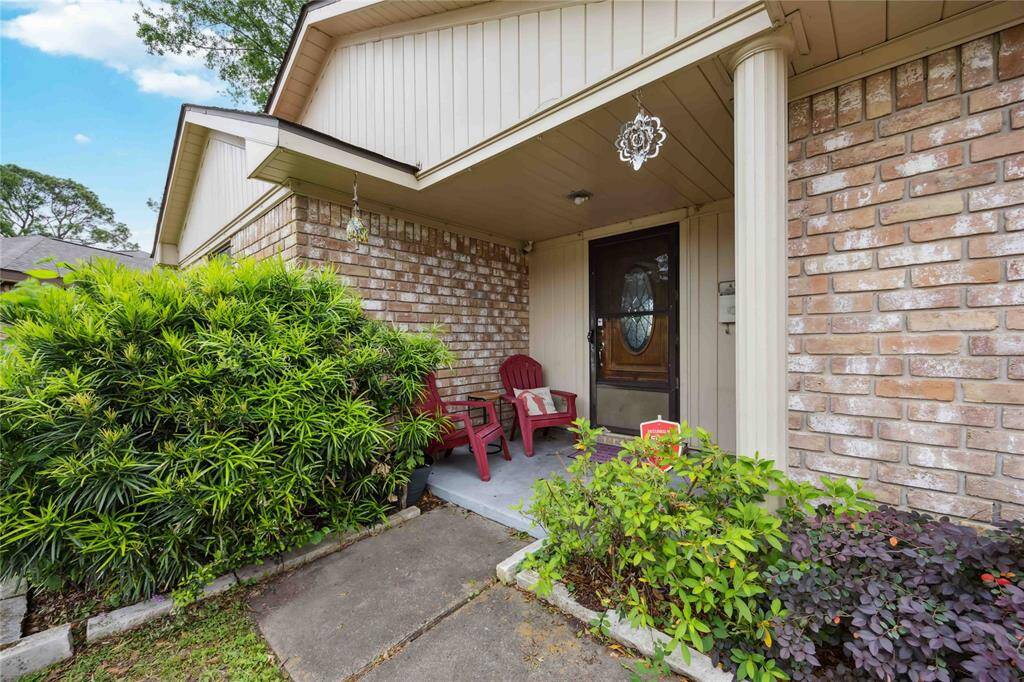 A covered entryway is large enough to add some seating.