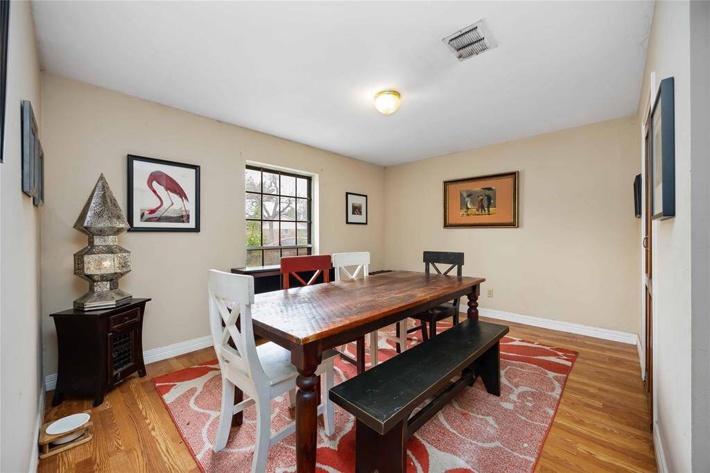 The formal dining room could easily be utilized as a sitting room or a study. If major renovations are what you have in mind, you could combine this space with the living room and kitchen to create an open floor plan.