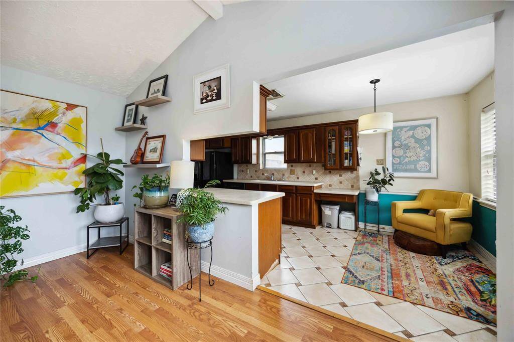 The current kitchen design has a pass-through. The space could be expanded and really opened up!