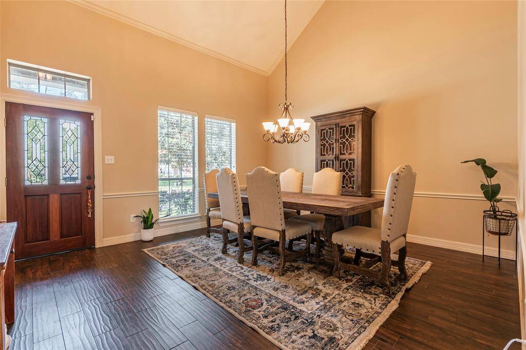 FRONT DOOR AND DINING ROOM VIEW