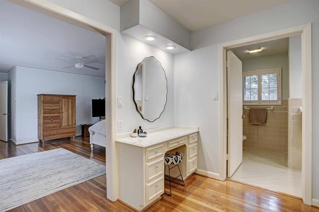 Spacious and charming dressing area at entry to Primary Bath.