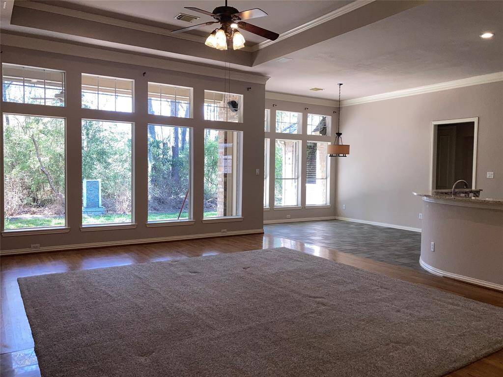Open concept Living room with large windows.