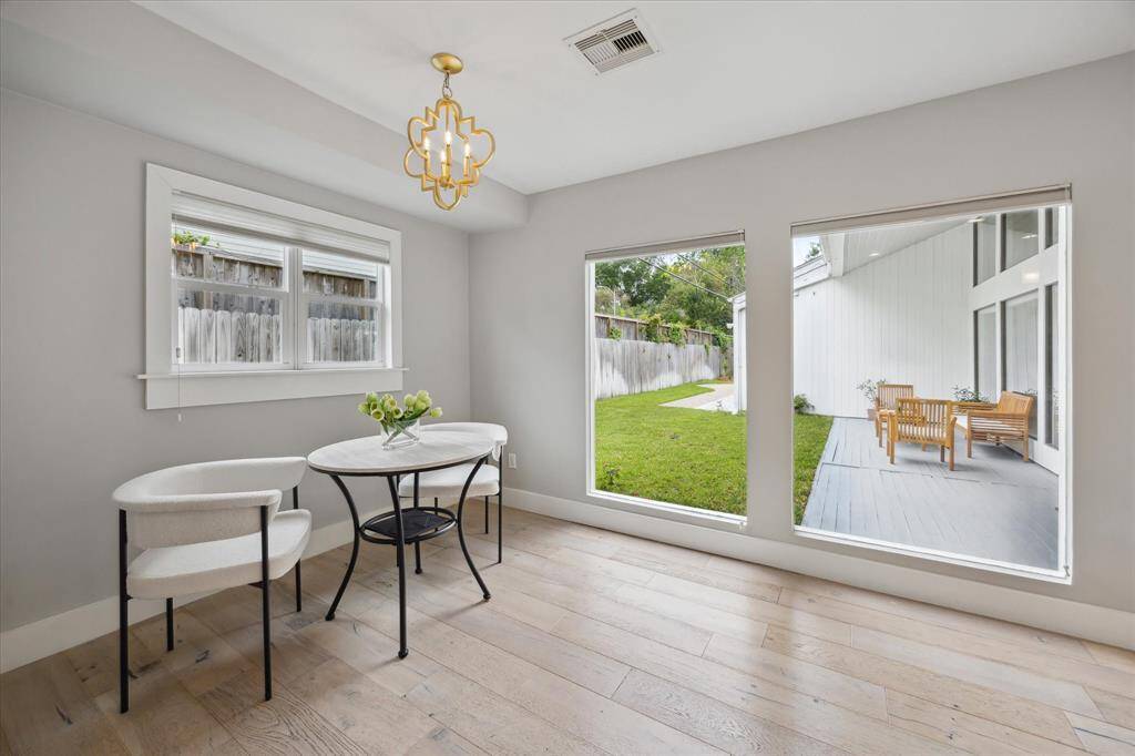 The breakfast nook with view of the backyard and patio space.