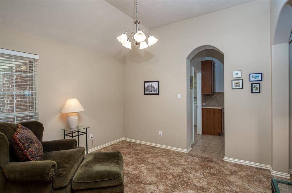 A thoughtfully designed flex room positioned between the foyer and the kitchen, presents an elegant space for formal dining, a refined study or a vibrant playroom!