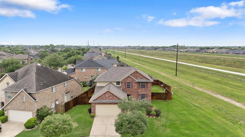Enjoy peaceful privacy on the corner, cul-de-sac lot—this home backs to a greenbelt with a walking path, offering extra space and tranquil views.