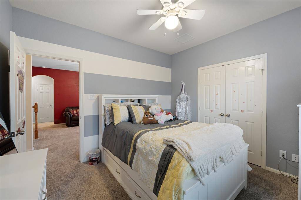 Offers a functional layout with hallway access to the upstairs living space.