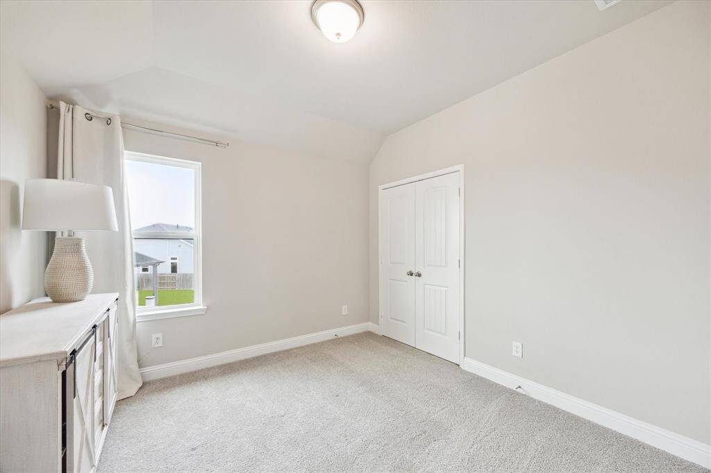 Third floor bedroom, just off the bonus area, and a access to a private bathroom on the same floor.