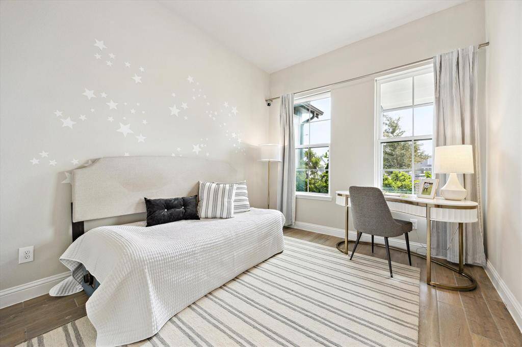 First floor bedroom overlooks the front yard and has great natural light.