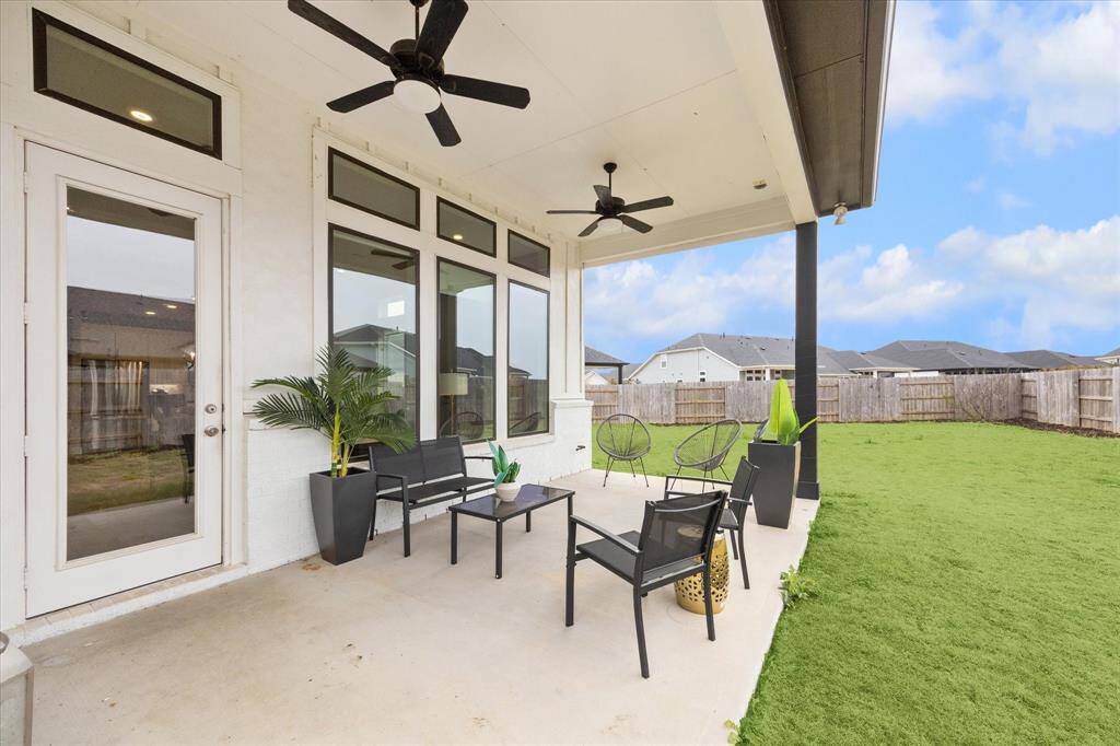 Enjoy the large outdoor space (7,955 sf lot) from your covered patio. Landscaped and room to add a pool or hot tub or whatever you like.