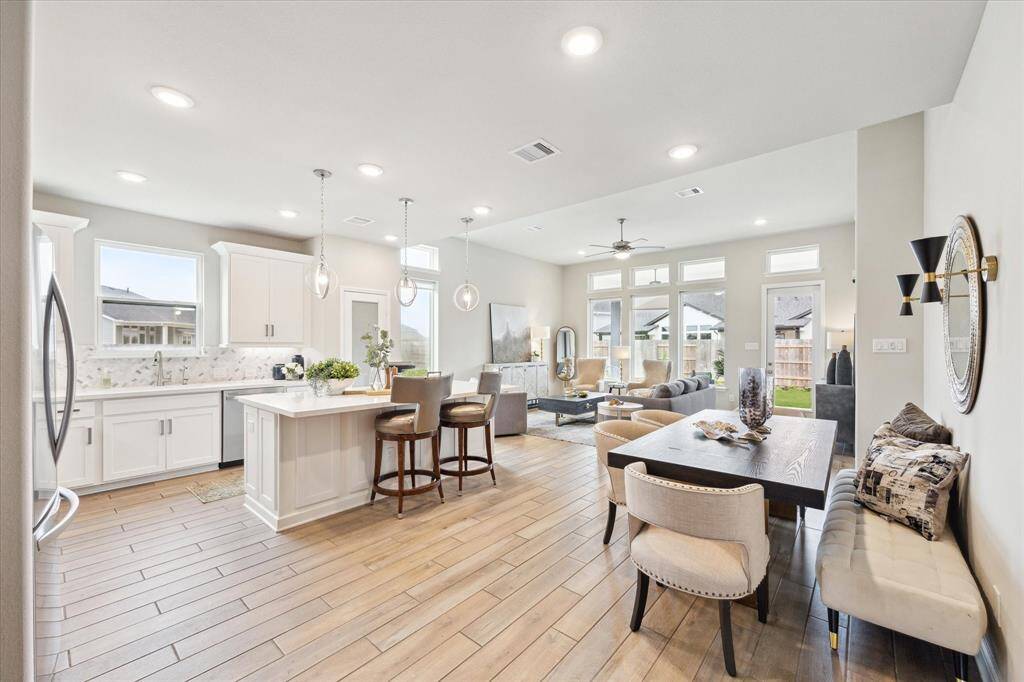 Enjoy lots of natural light and views to the back yard. Great space for entertaining and spending time with family and friends.