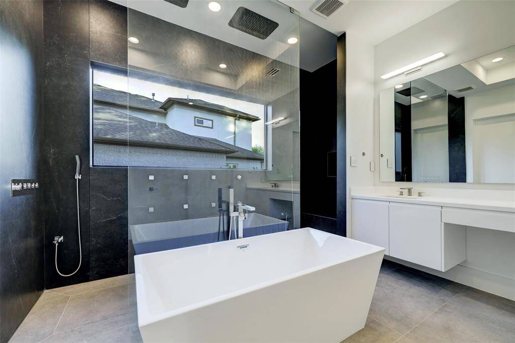 Dual true rainfall shower hall with ambient lighting features, and built in bluetooth shower speaker.