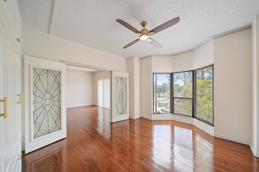 Bedroom #2. Beautifully accented French doors.