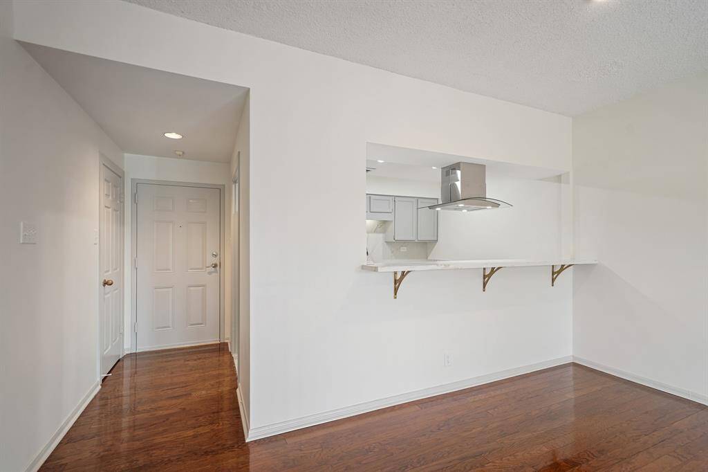 The kitchen is open to the living room. Pull up a barstool and enjoy those quick morning meals.
