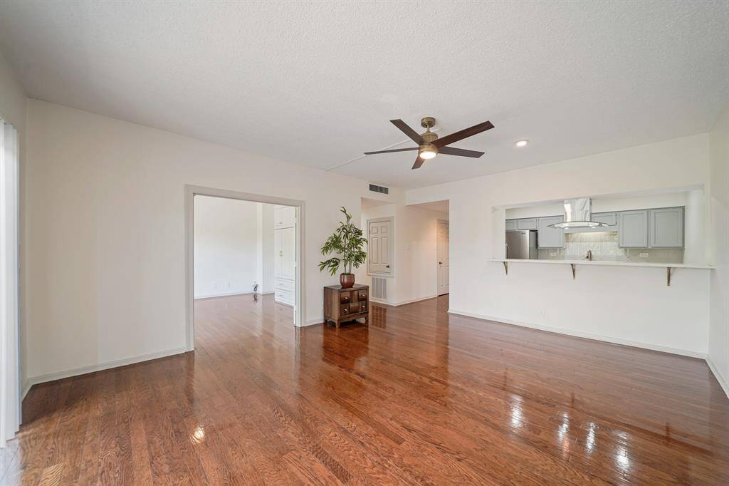 Beautiful wood flooring and a ceiling light and fan installed as well!