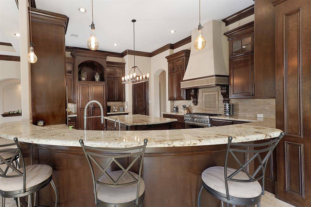 Gourmet kitchen with high-end appliances and exquisite cabinetry