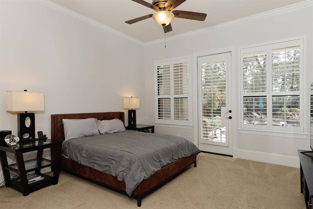 First floor guest retreat features a  private bathroom, large walk-in closet and patio access