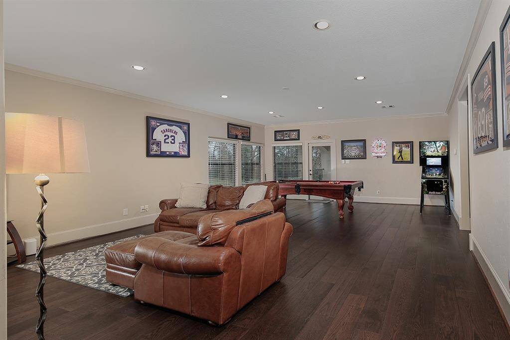 Oversized gameroom with balcony access featuring amazing pool and golf course views