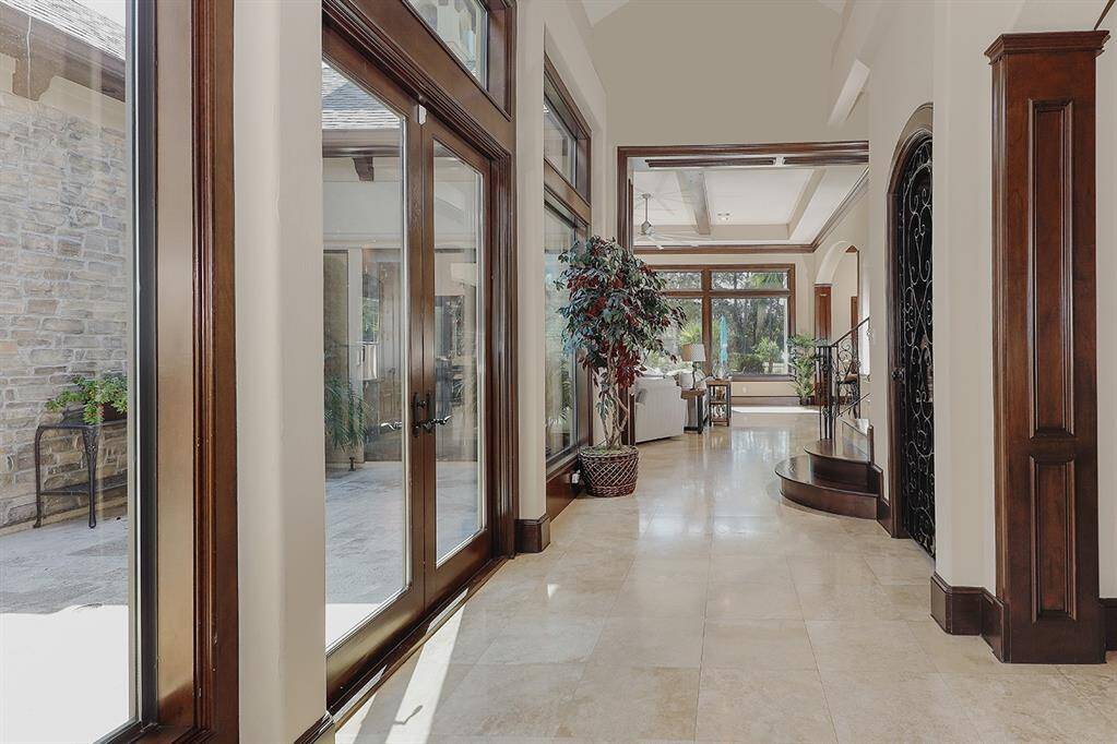 Scenic views of the backyard, pool, courtyard and golf course