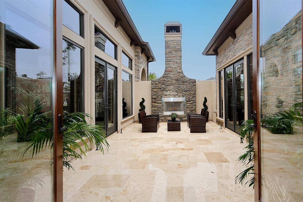 Private courtyard and attractive fireplace