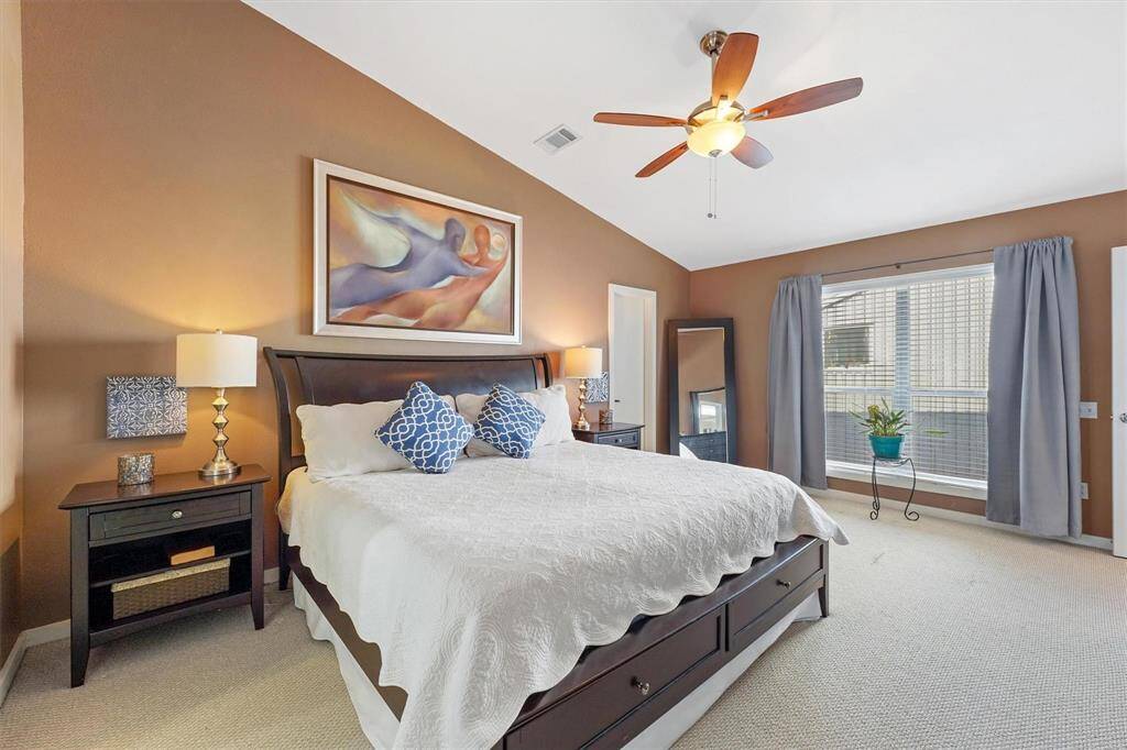 Previous photo of an alternate view of the primary bedroom.