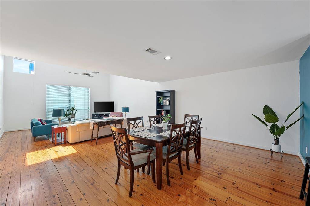 Light and bright. You'll find the perfect space to host your friends and family in this spacious second floor open-concept living/dining/kitchen.