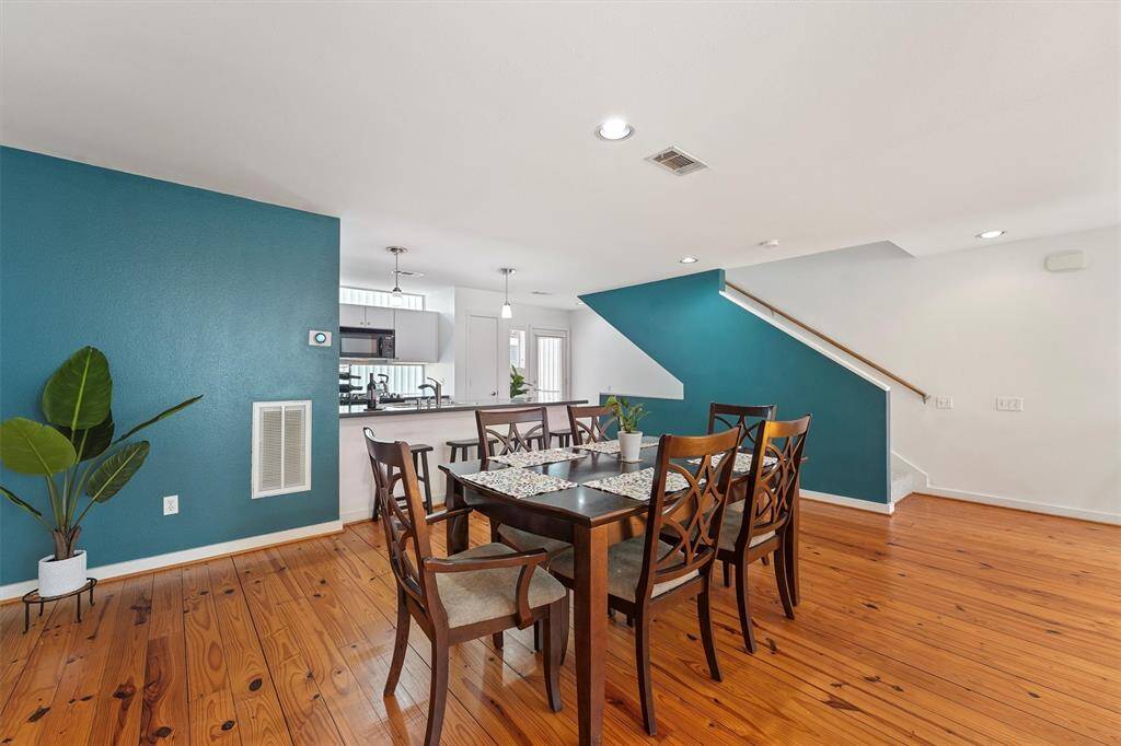 There is plenty of room in this dining area for a large table to host your family and friends!