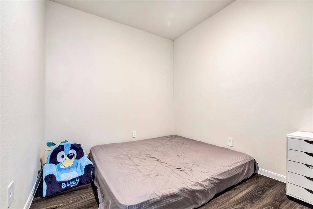 Home office that is being used as a playroom/bedroom currently. Enjoy flexibility with this extra space that can be a gym, office, or guest room!