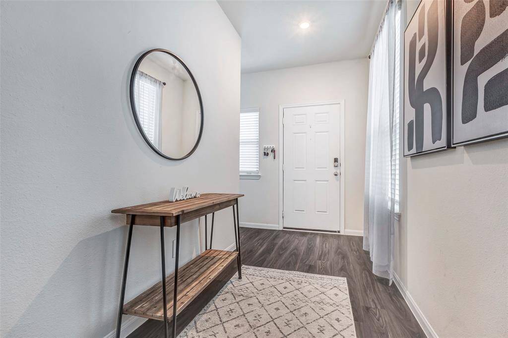 A beautiful entryway that leads into your living room.