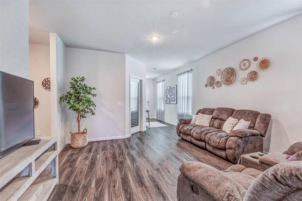 The home features modern flooring for easy clean up and a modern feel.