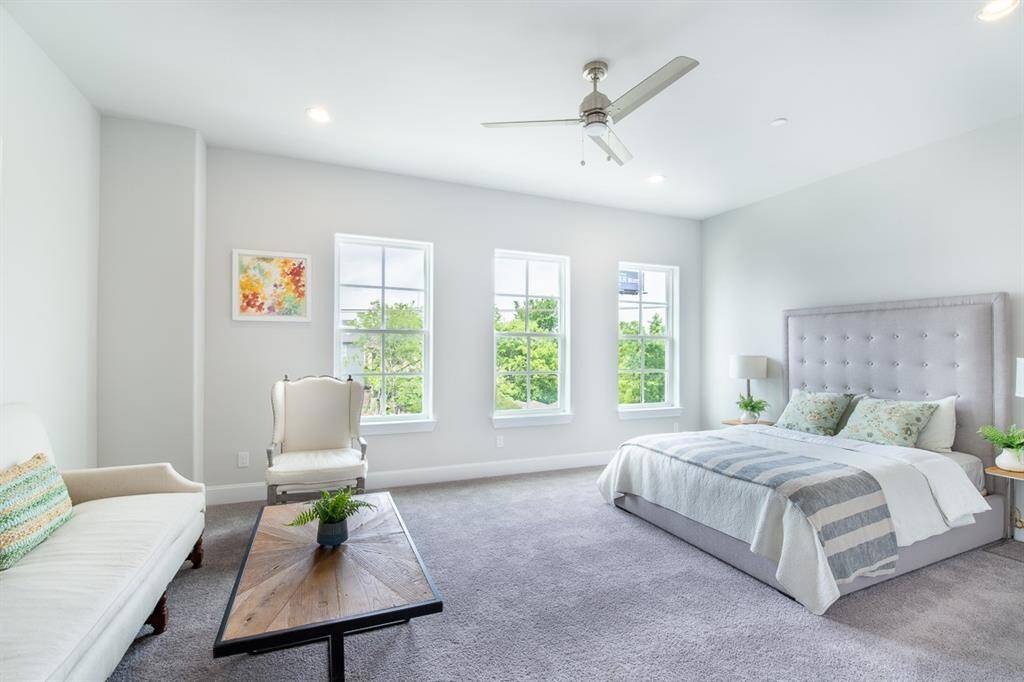 So comfy with the the large windows and tall ceilings. Similar plan and finishes.