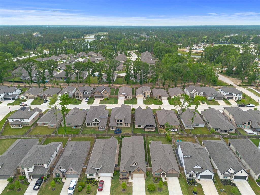 Ariel view from the front of the home and surrounding area.
