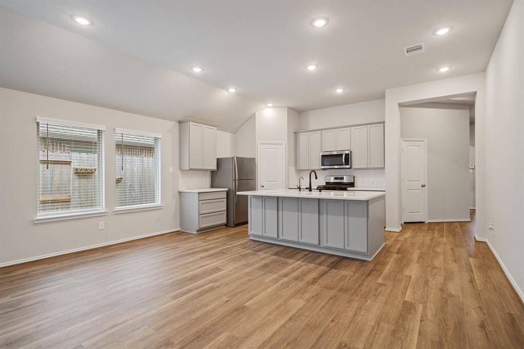 View of the kitchen/dining combo spaces.