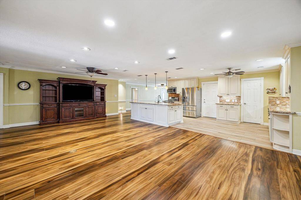 Open-concept kitchen and family room create a seamless space for cooking, dining, and relaxing.