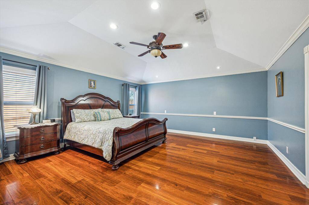 Spacious primary bedroom offering plenty of room for relaxation and comfort.