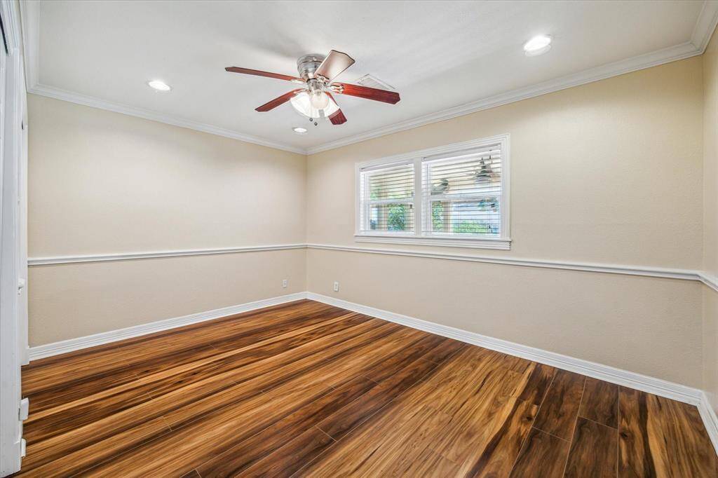 Secondary bedroom located at the front of the home.