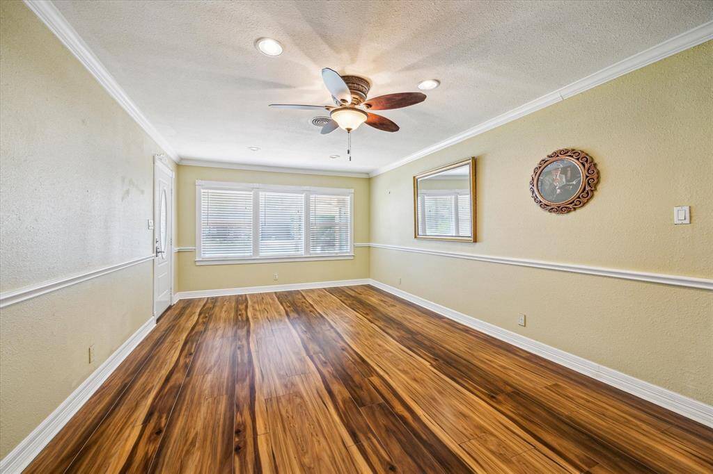 Bright and inviting living room located just off the front entry